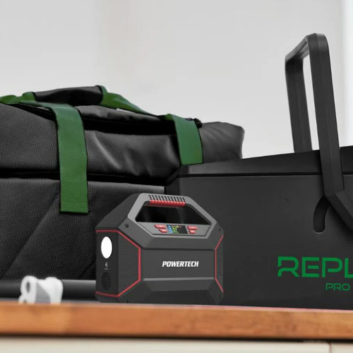 Powertech portable power station beside a REPLAY Pro unit and carry bag